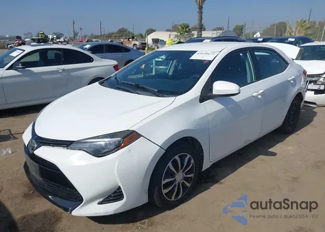 2017 Toyota Corolla Le z USA, uszkodzony, nr VIN 5YFBURHEXHP677088
